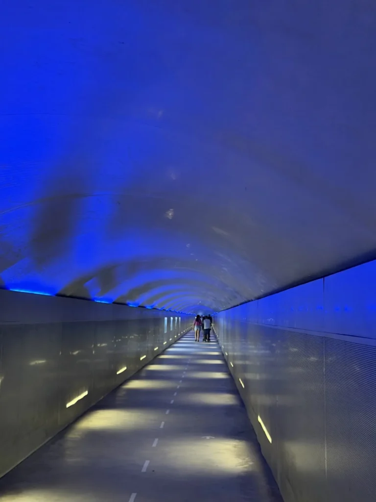 The walk to the lift through the tunnel